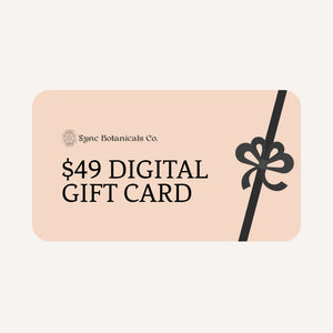 Sync Botanicals $49 digital gift card for a one month supply, in blush pink with a dark ribbon and bow.
